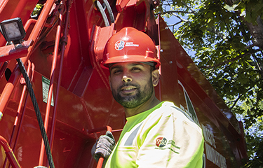 WIN employee operating trash truck